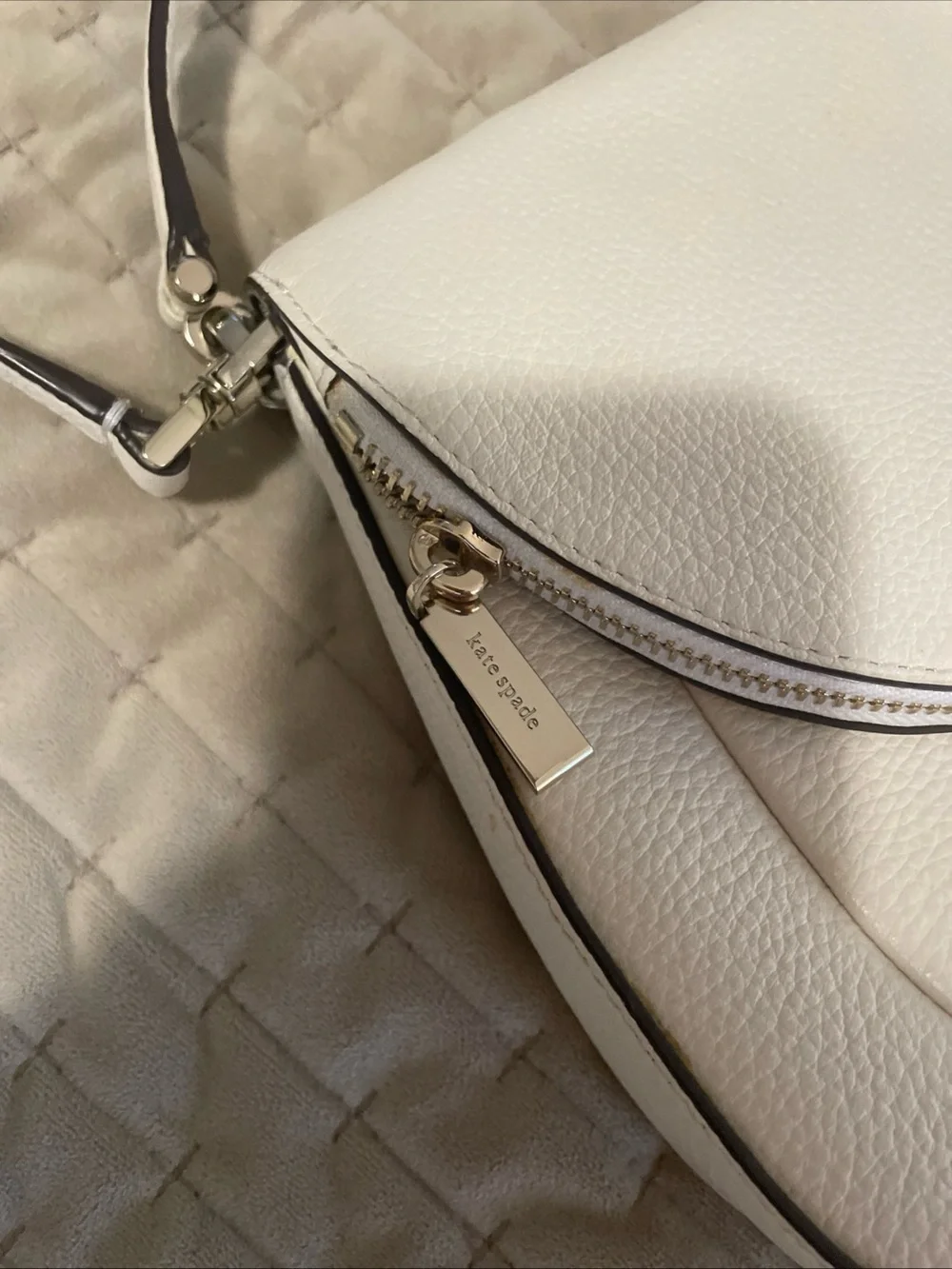 kate spade cream pebbled leather crossbody with gold logo